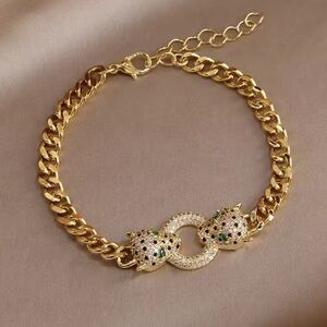 Anthropologie Gold Panther Bracelet with Green Accents